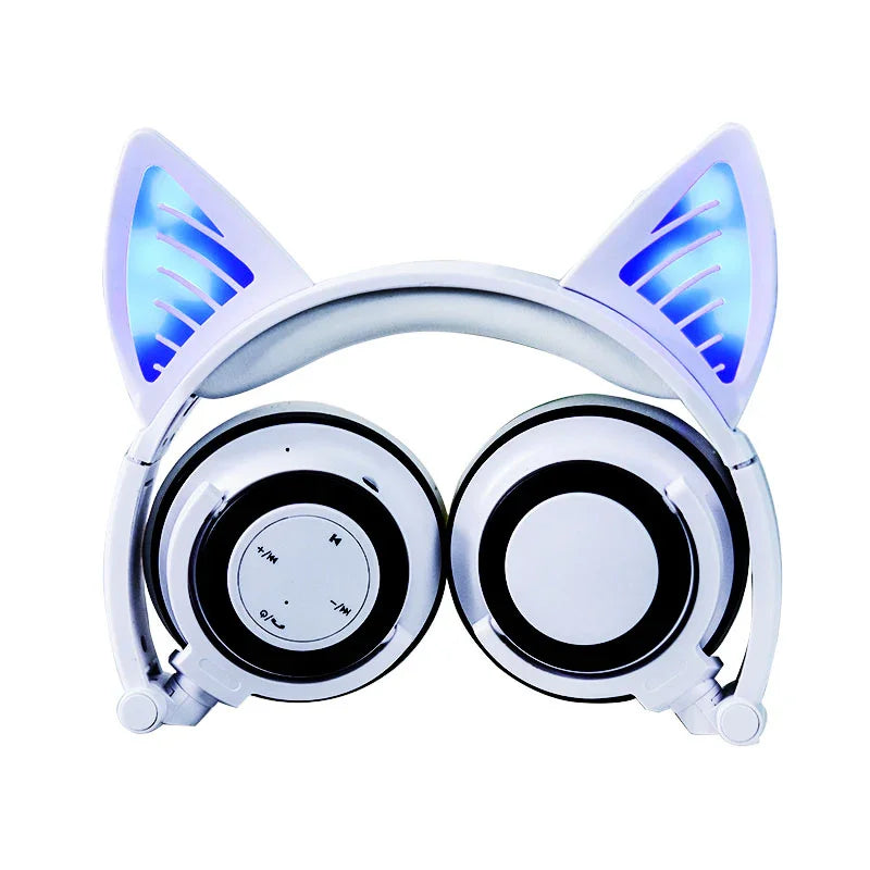 White foldable wireless headphones with blue light-up cat ears and circular ear cups