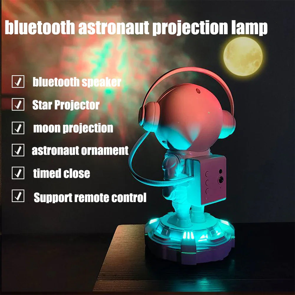 Bluetooth astronaut projection lamp with star and moon projections, glowing turquoise on wooden table