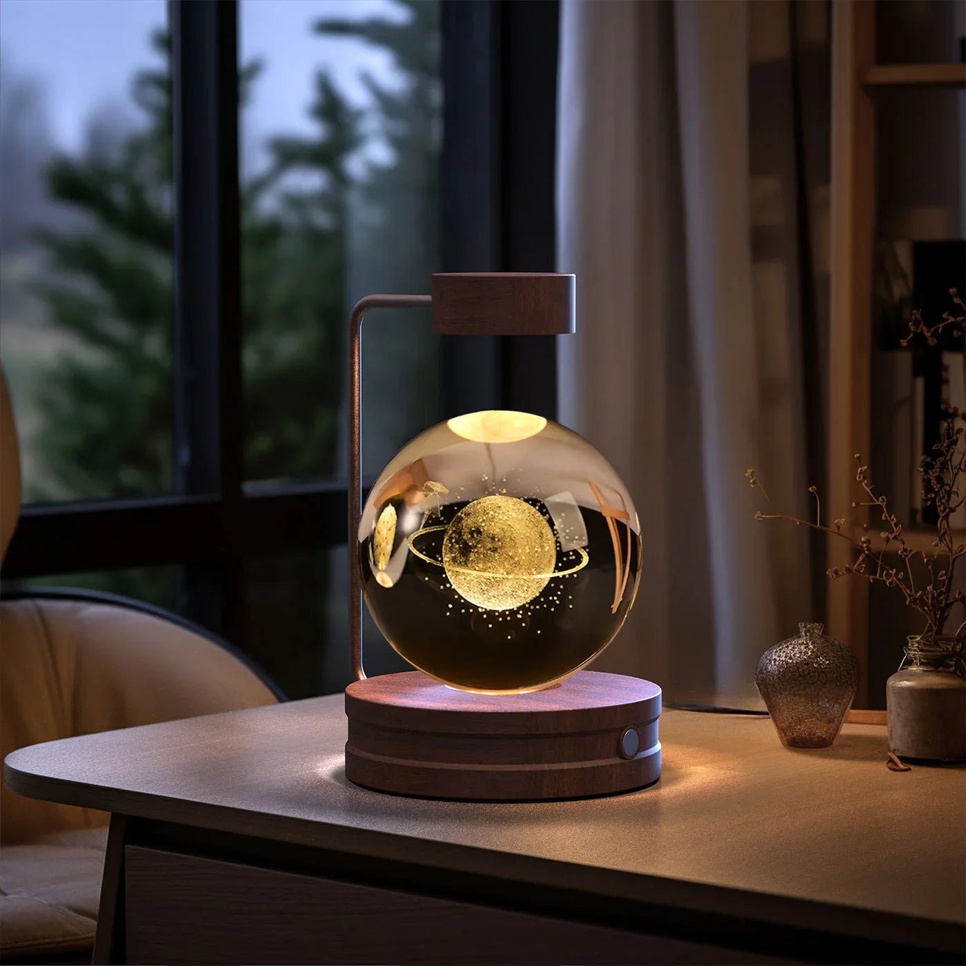 Modern wooden desk lamp with floating glass globe and illuminated golden planet design
