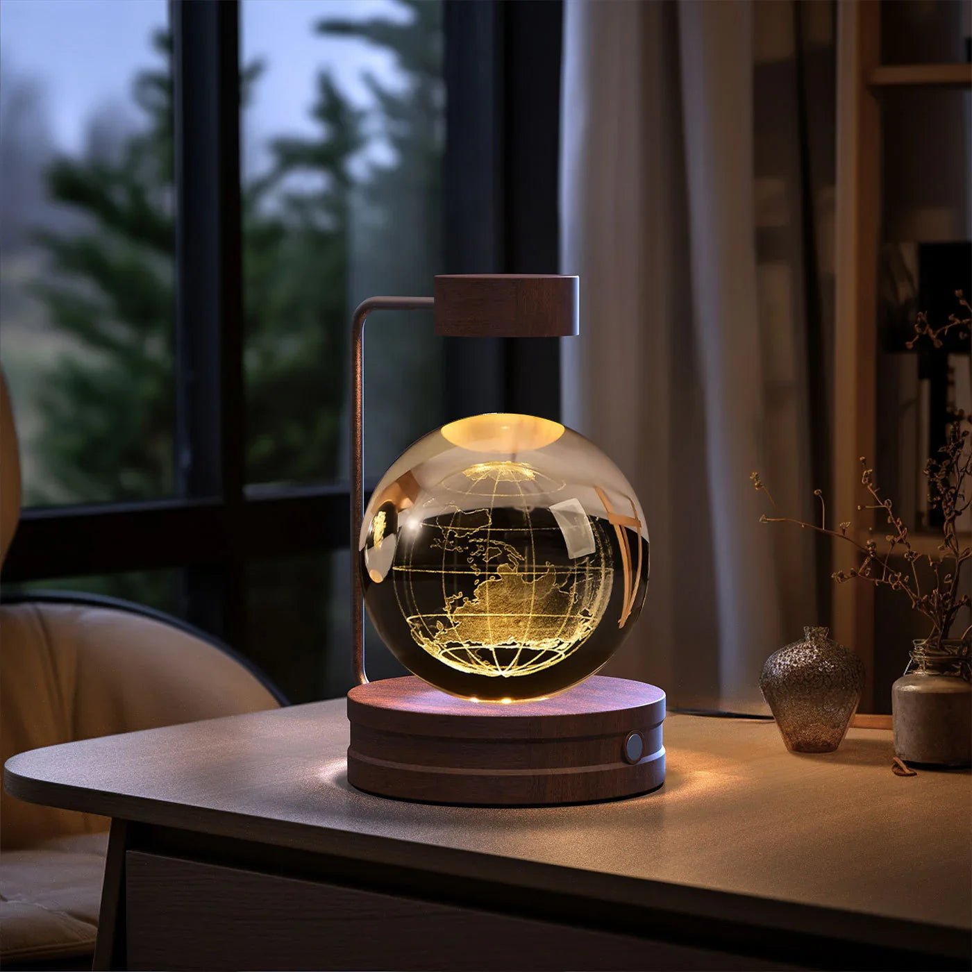 Modern levitating globe lamp with wooden base on desk near window in cozy room