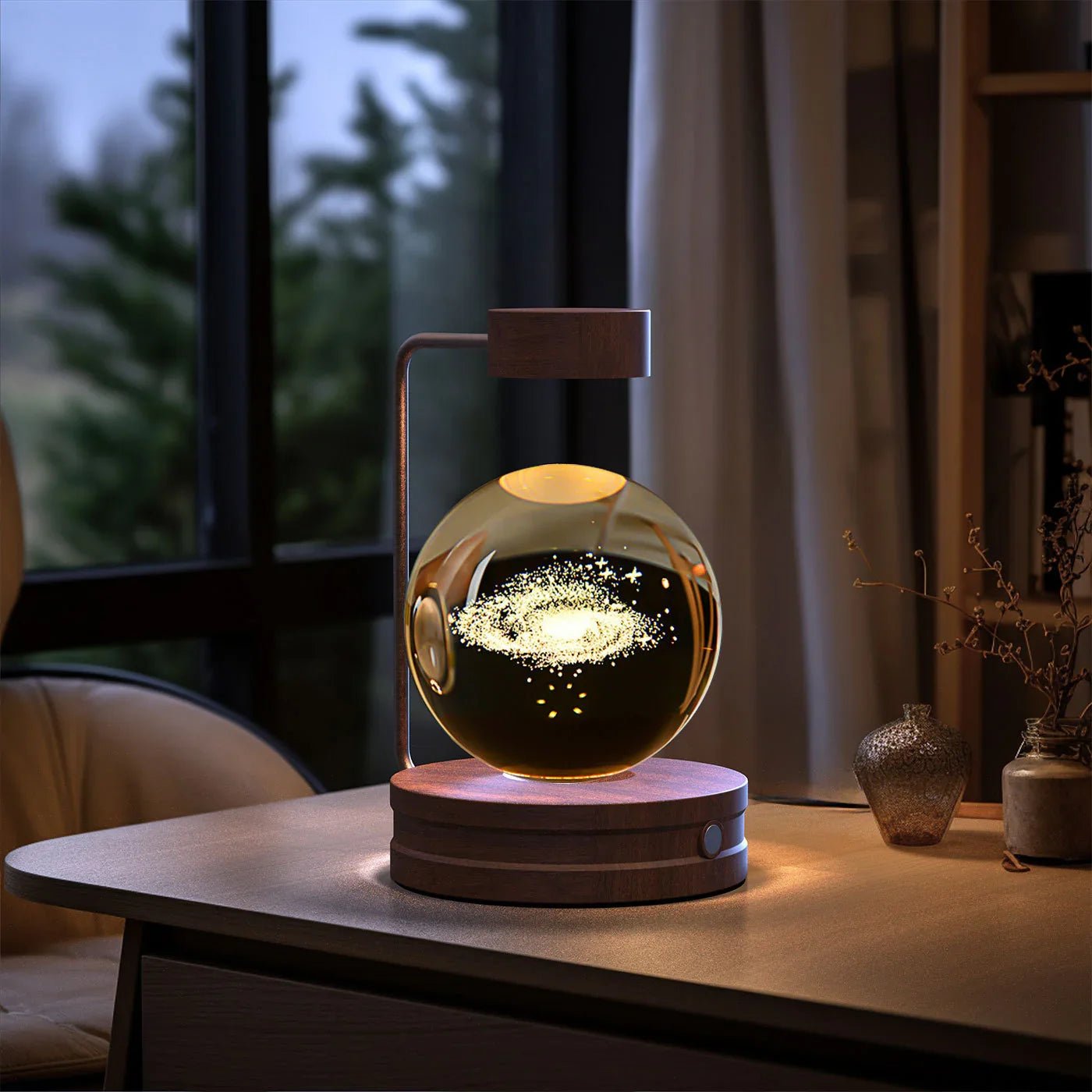 Modern wooden levitating galaxy lamp on desk in cozy room with window and chair