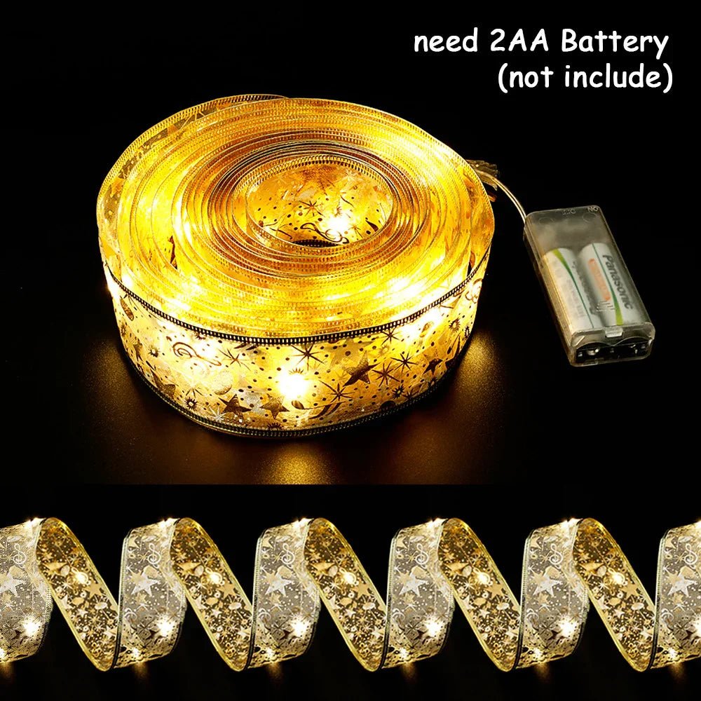 Decorative battery-operated LED ribbon lights with star and snowflake patterns glowing warm yellow