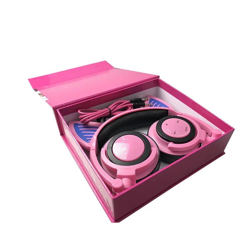 Pink cat ear headphones with volume control in pink box with matching pink cable